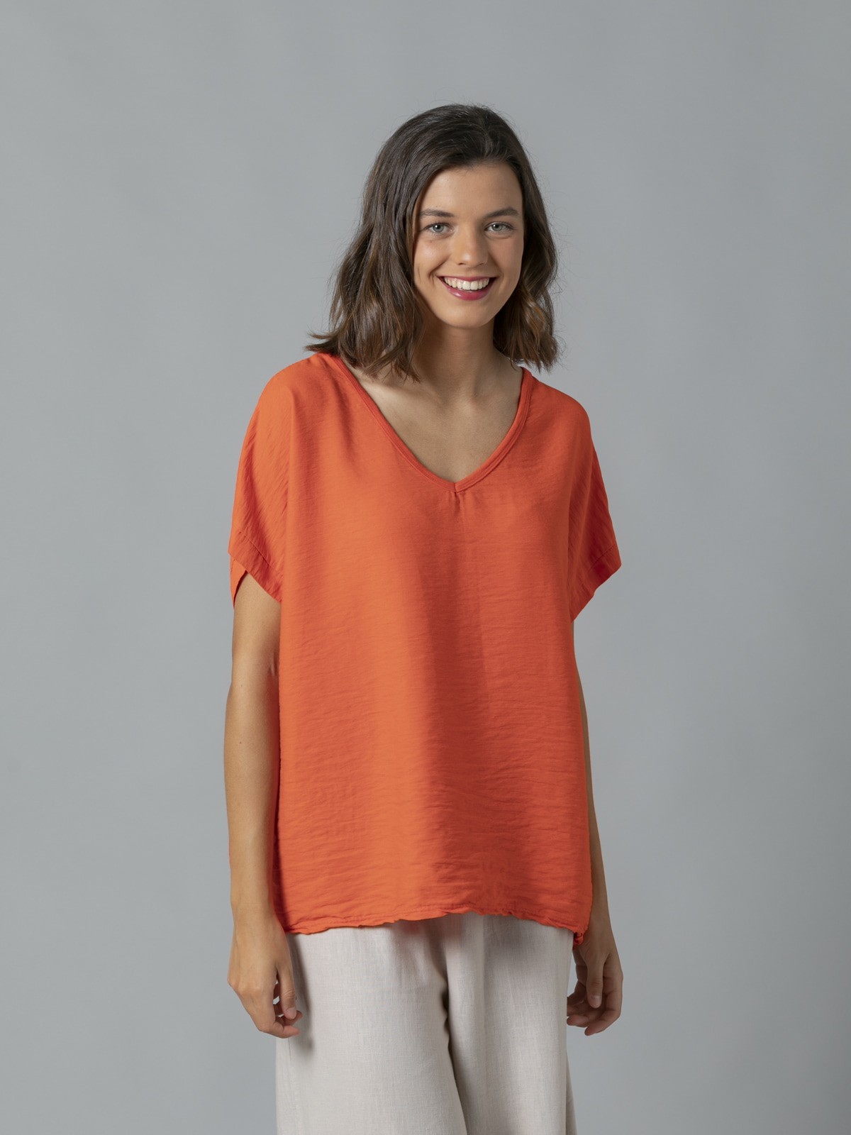 Woman V-neck blouse in 2 fabrics Orange