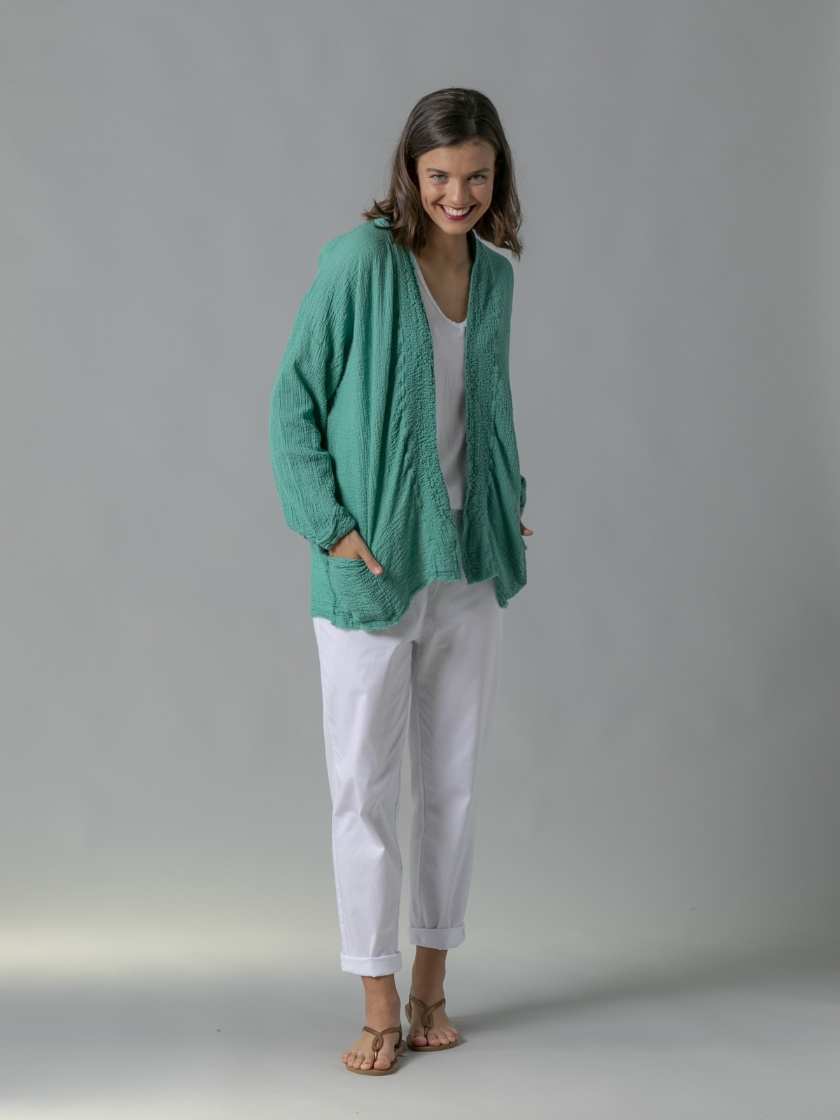 Woman Crinkled knit jacket with pockets Green