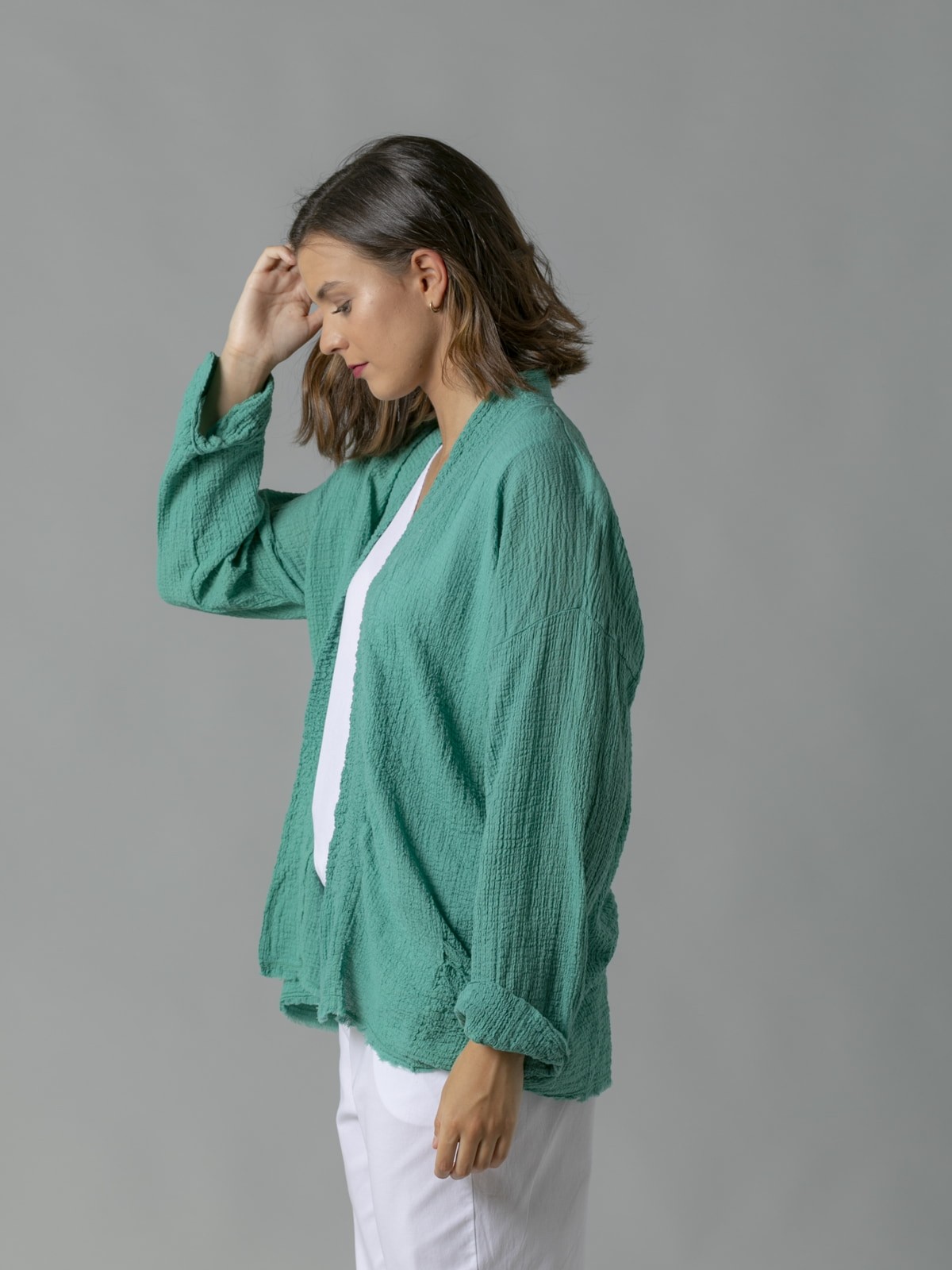 Woman Crinkled knit jacket with pockets Green