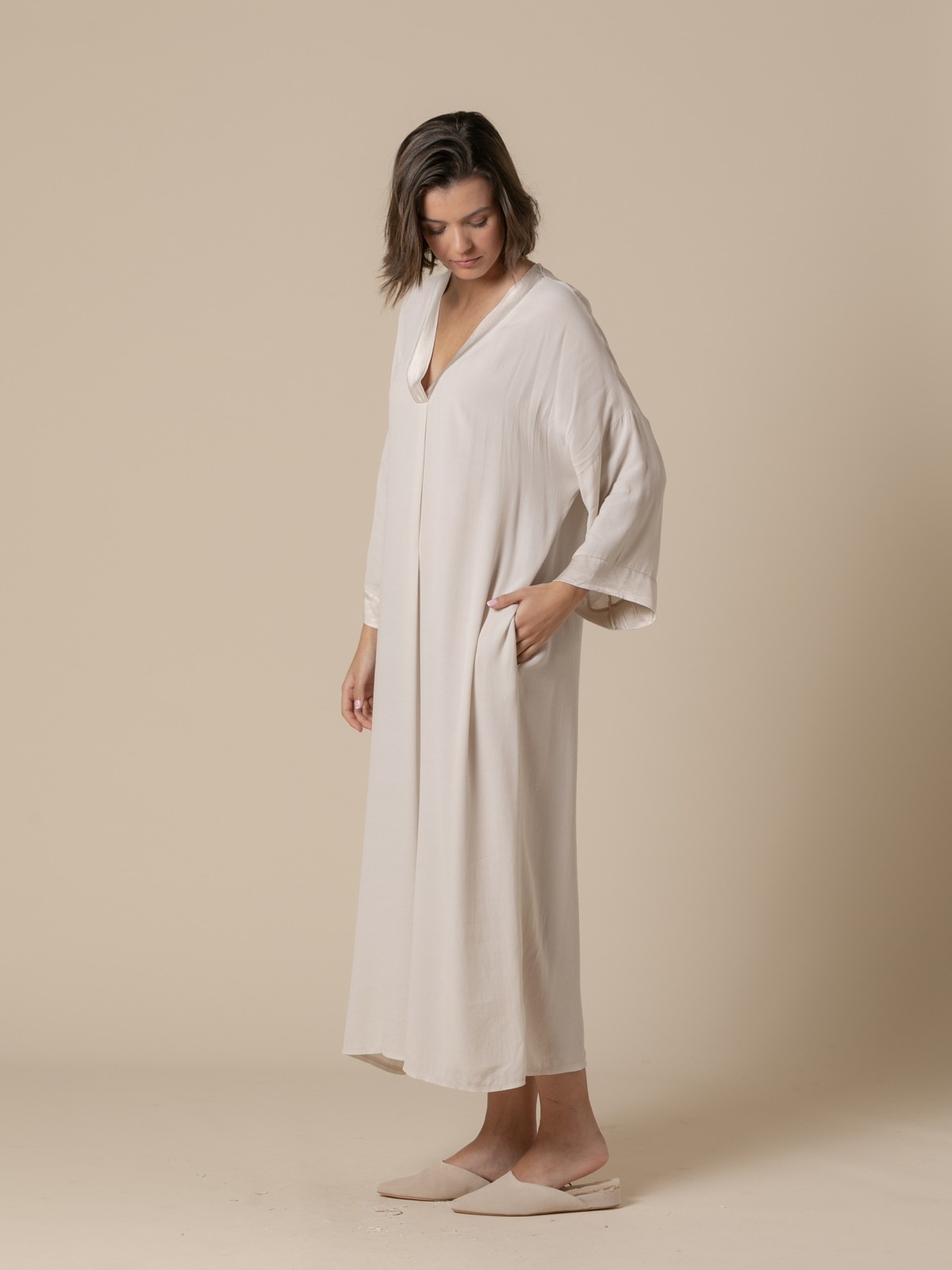 Woman Long flowing V-neck dress  Beige