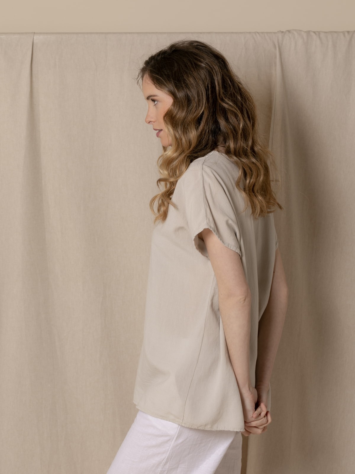 Woman V-neck blouse with satin trims Beige