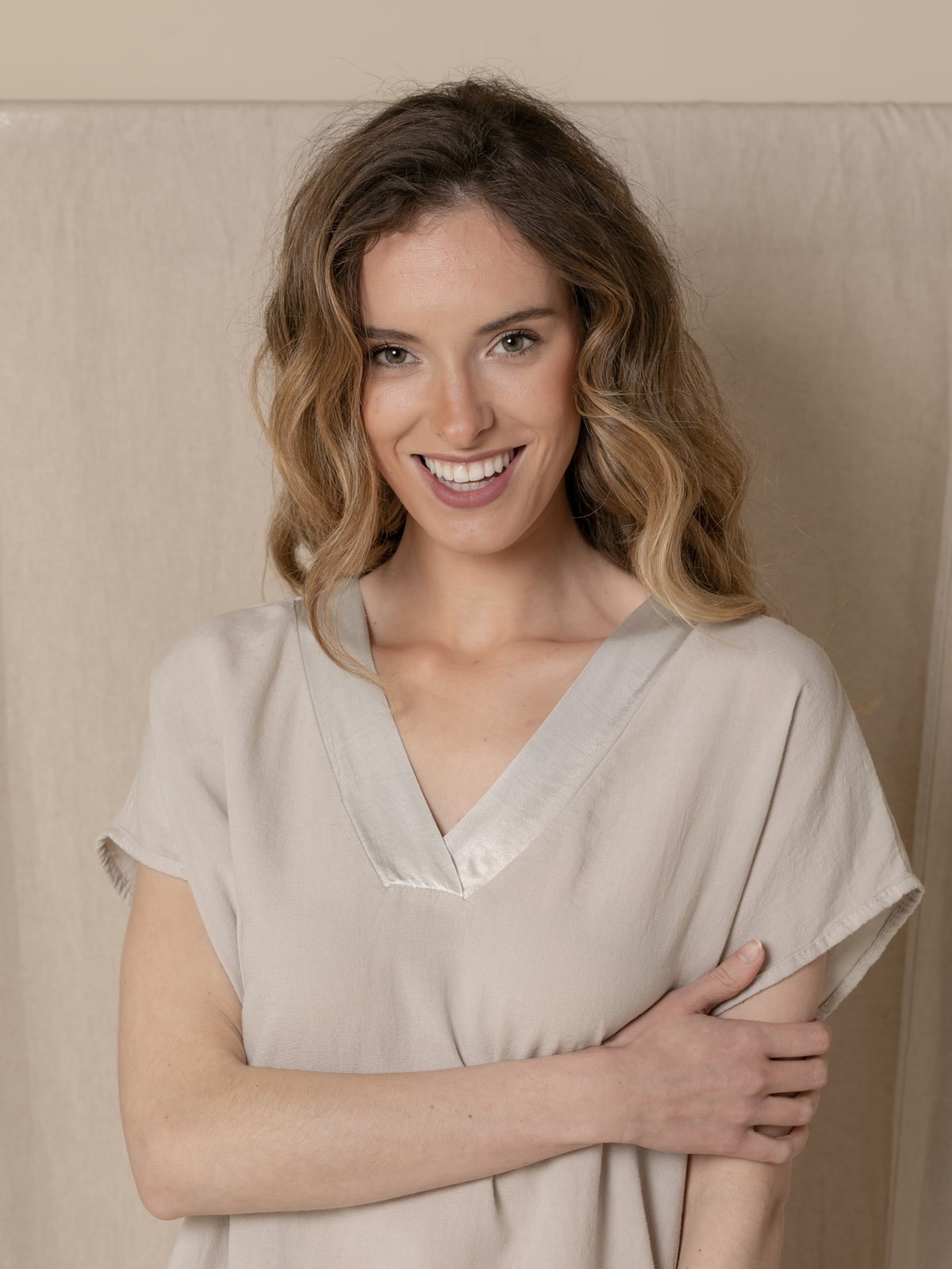 Woman V-neck blouse with satin trims Beige