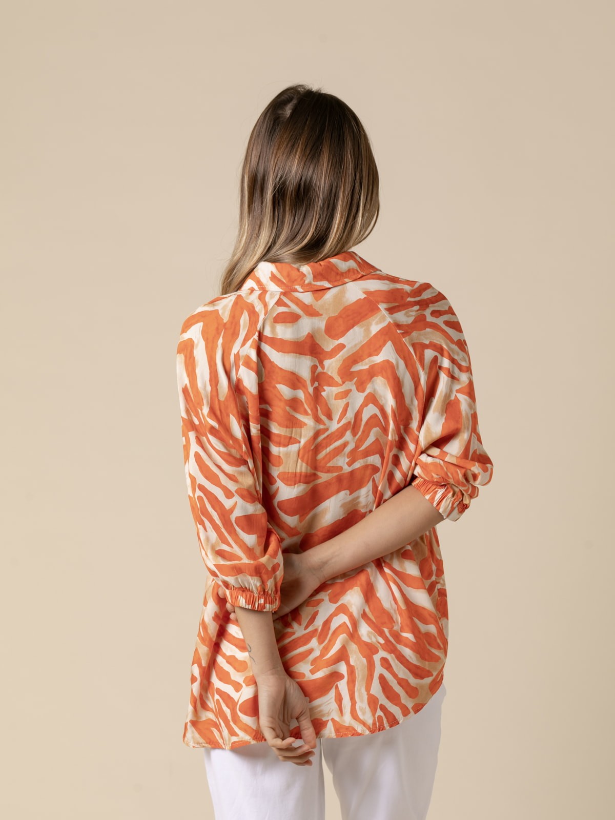 Blusa estampada animal print color Naranja