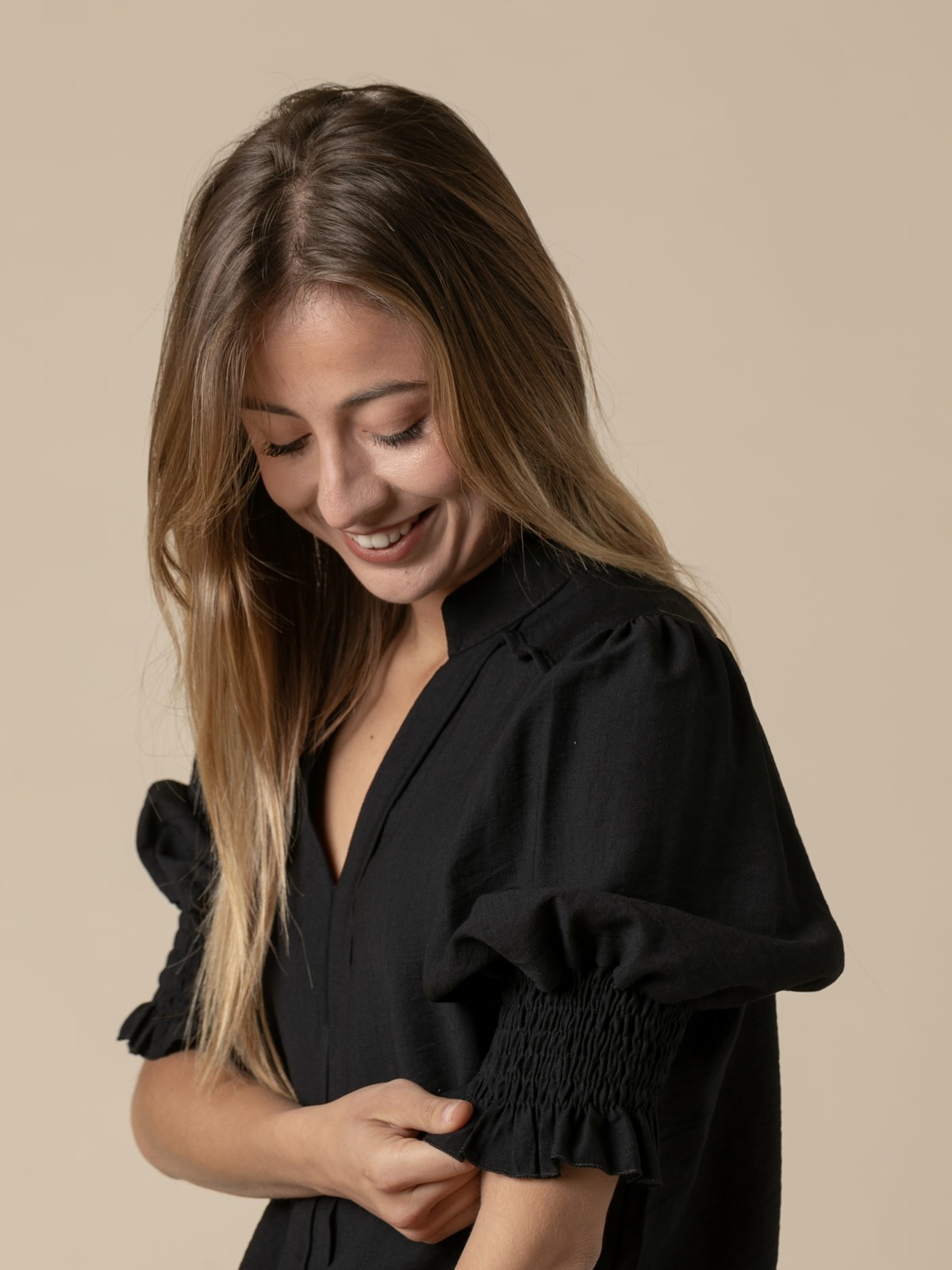 Woman High V-neck shirt with elastic sleeves  Blackcolour