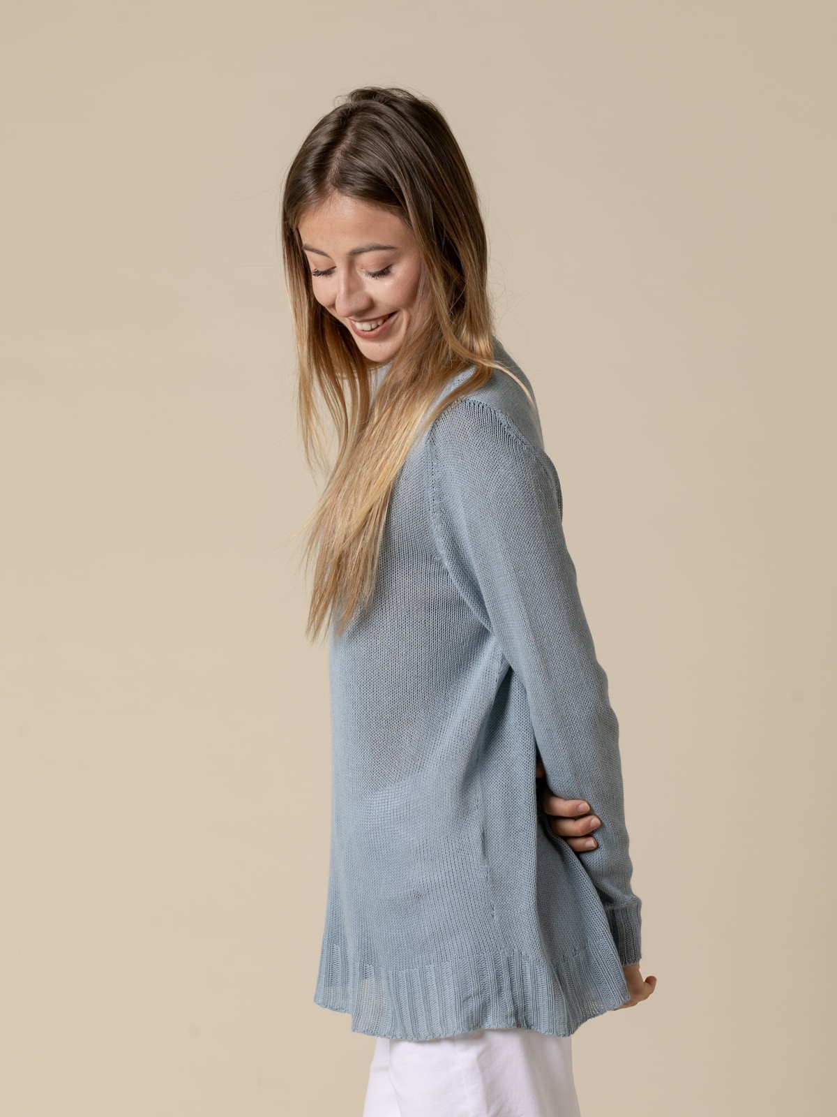 Inés flowy sweater with detail on the hem  Aqua colour