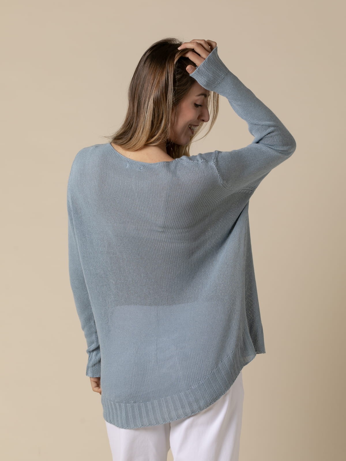Inés flowy sweater with detail on the hem  Aqua colour