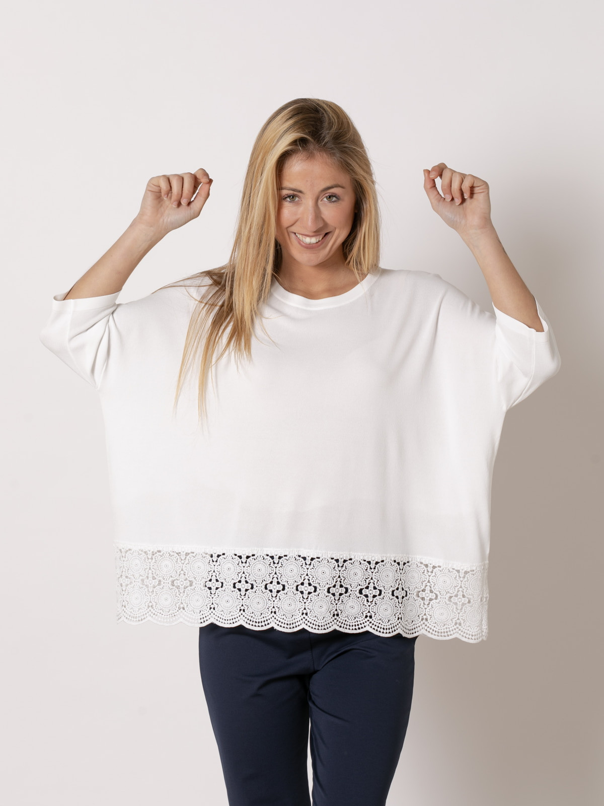 Flowing jersey with detail at the bottom  White colour