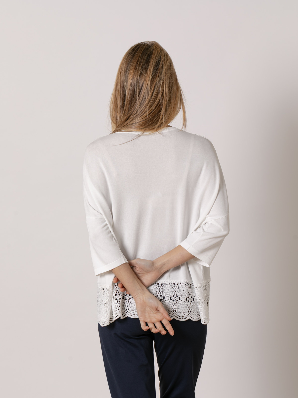 Flowing jersey with detail at the bottom  White colour