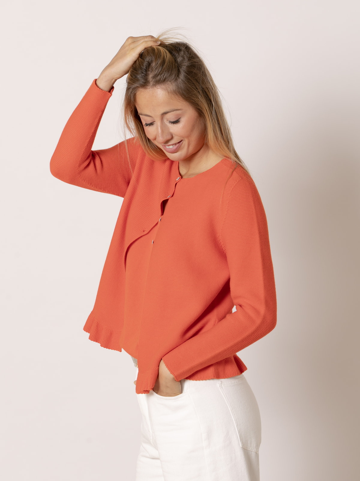 100% cotton jacket with mother-of-pearl buttons  Orange colour