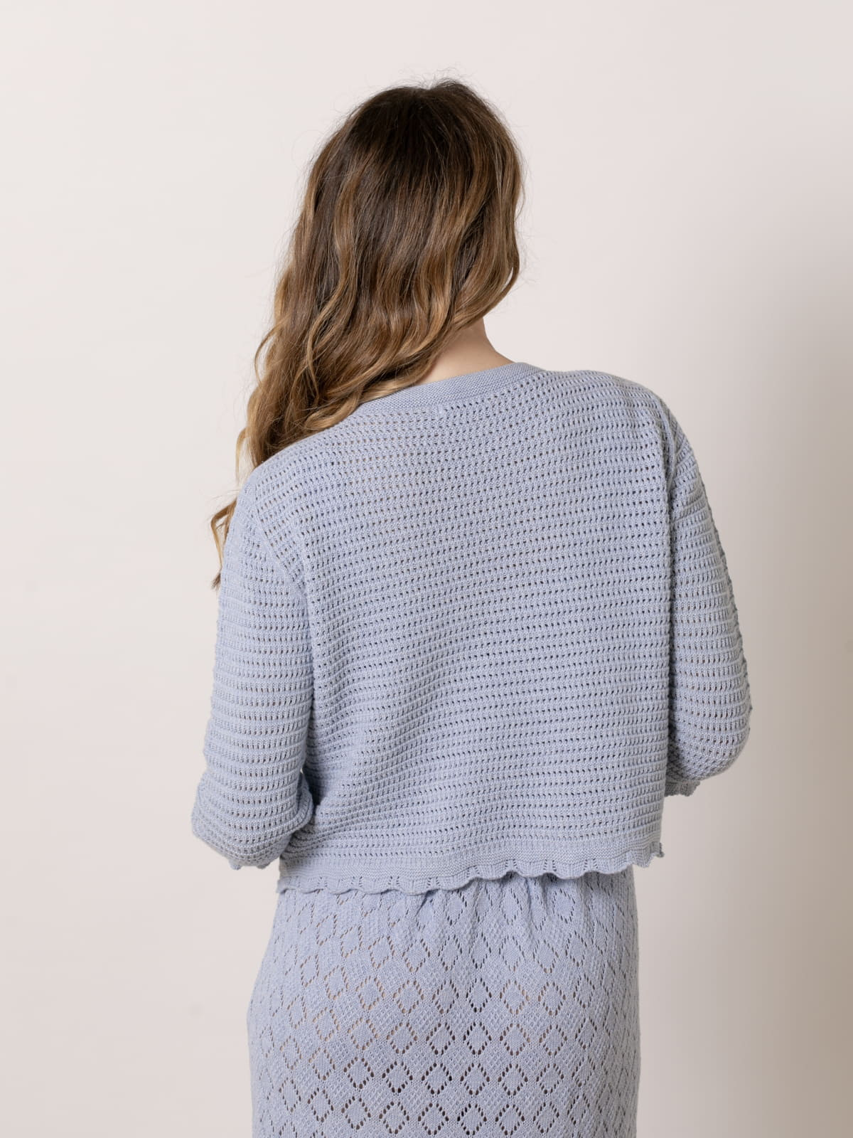 Chaqueta de punto calada trendy color celeste