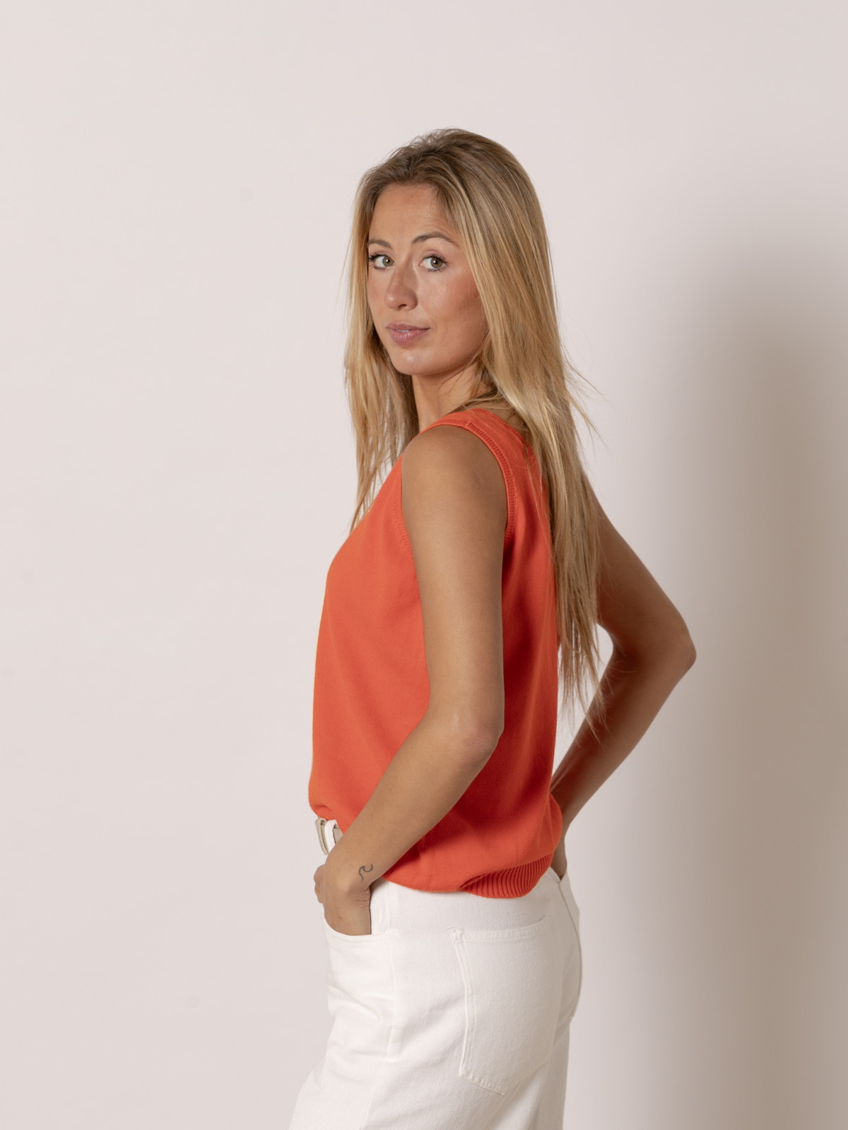 100% cotton knit top with V-neck  Orange colour
