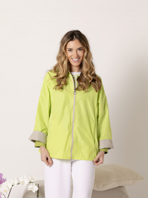 Waterproof jacket with piping  verde fluor colour