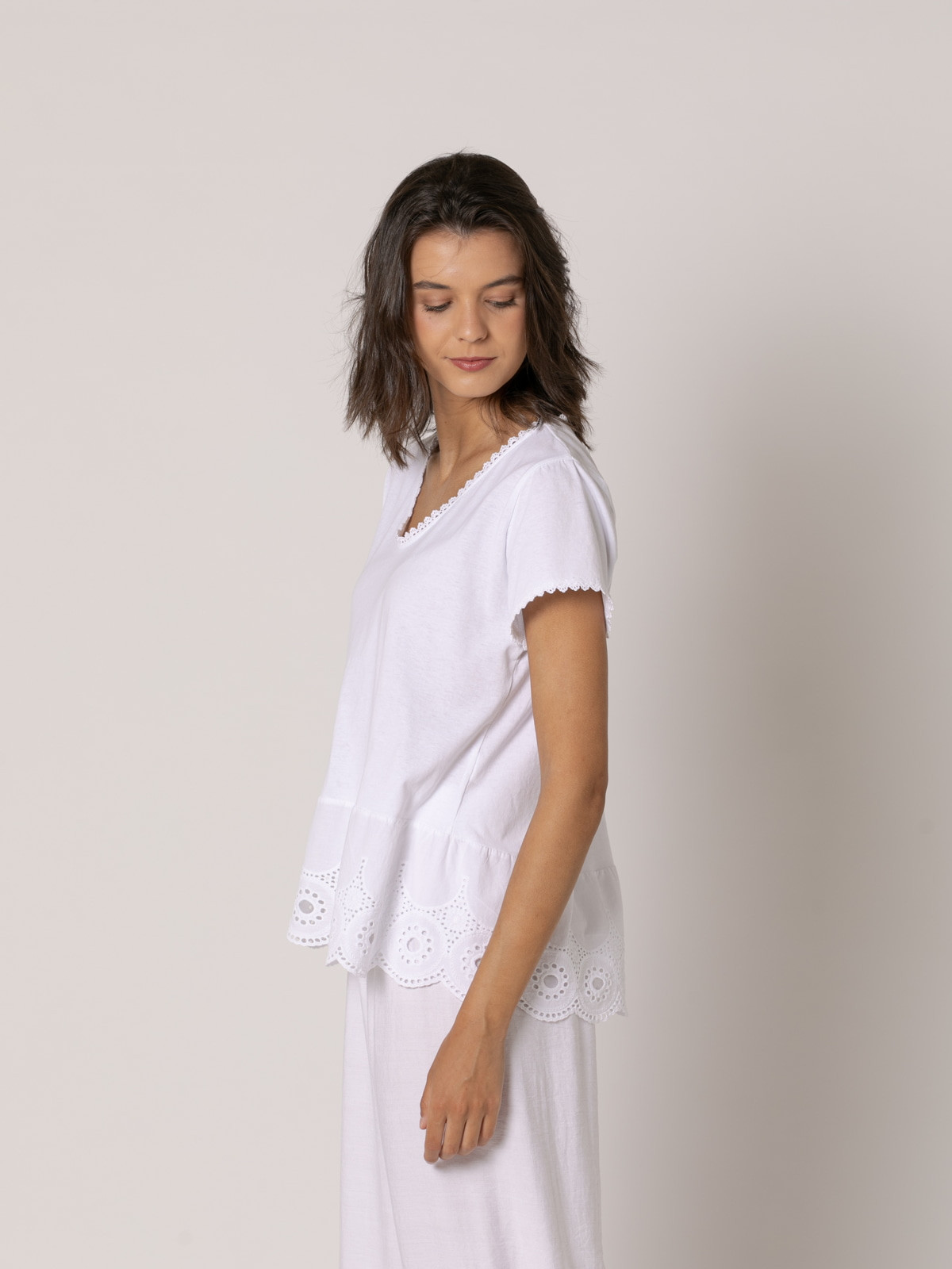 T-shirt with lace detail at the bottom  White colour