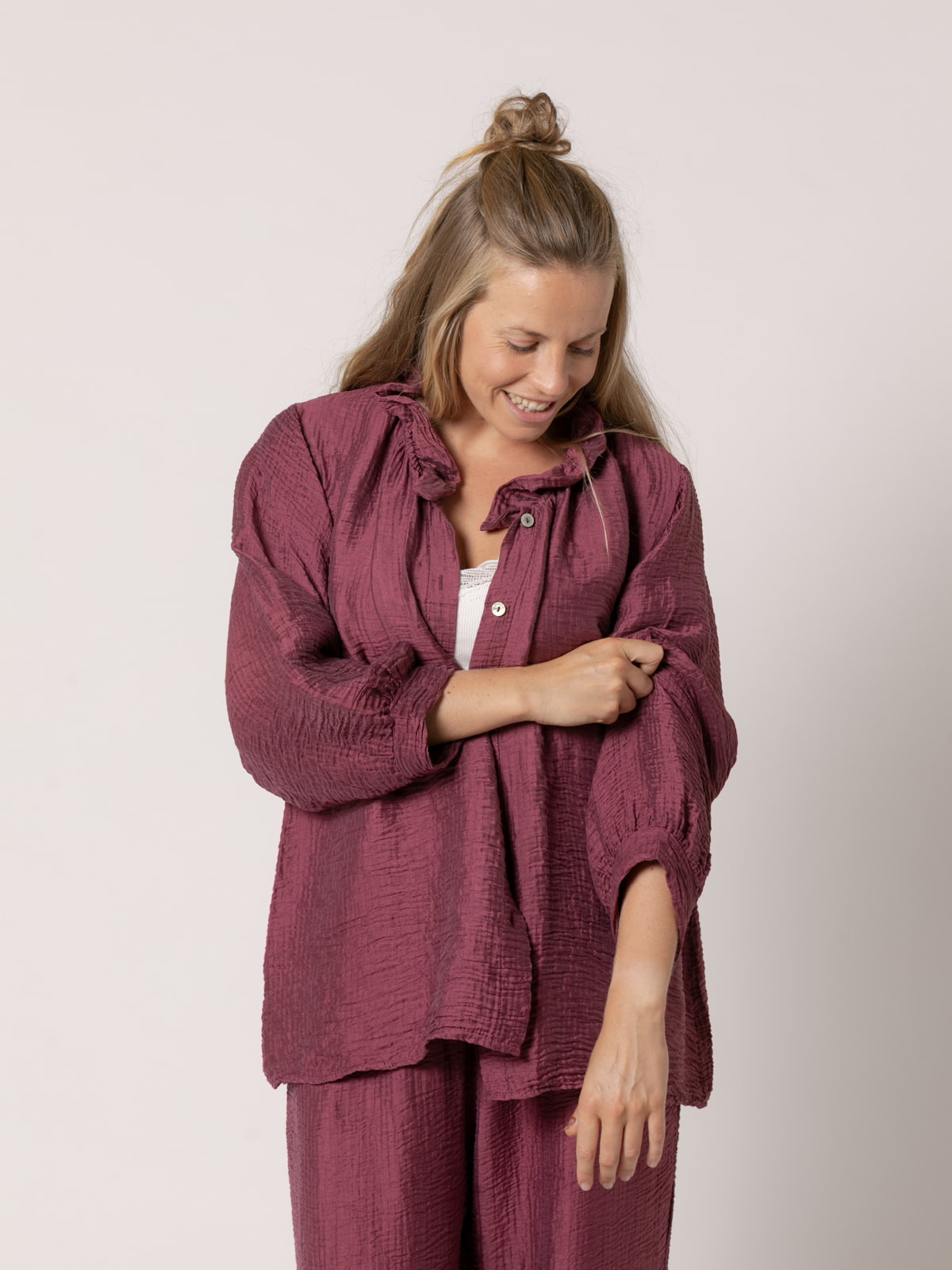 Camisa rizo volante brillo color Malva