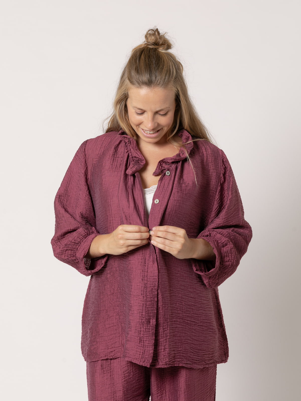 Camisa rizo volante brillo color Malva