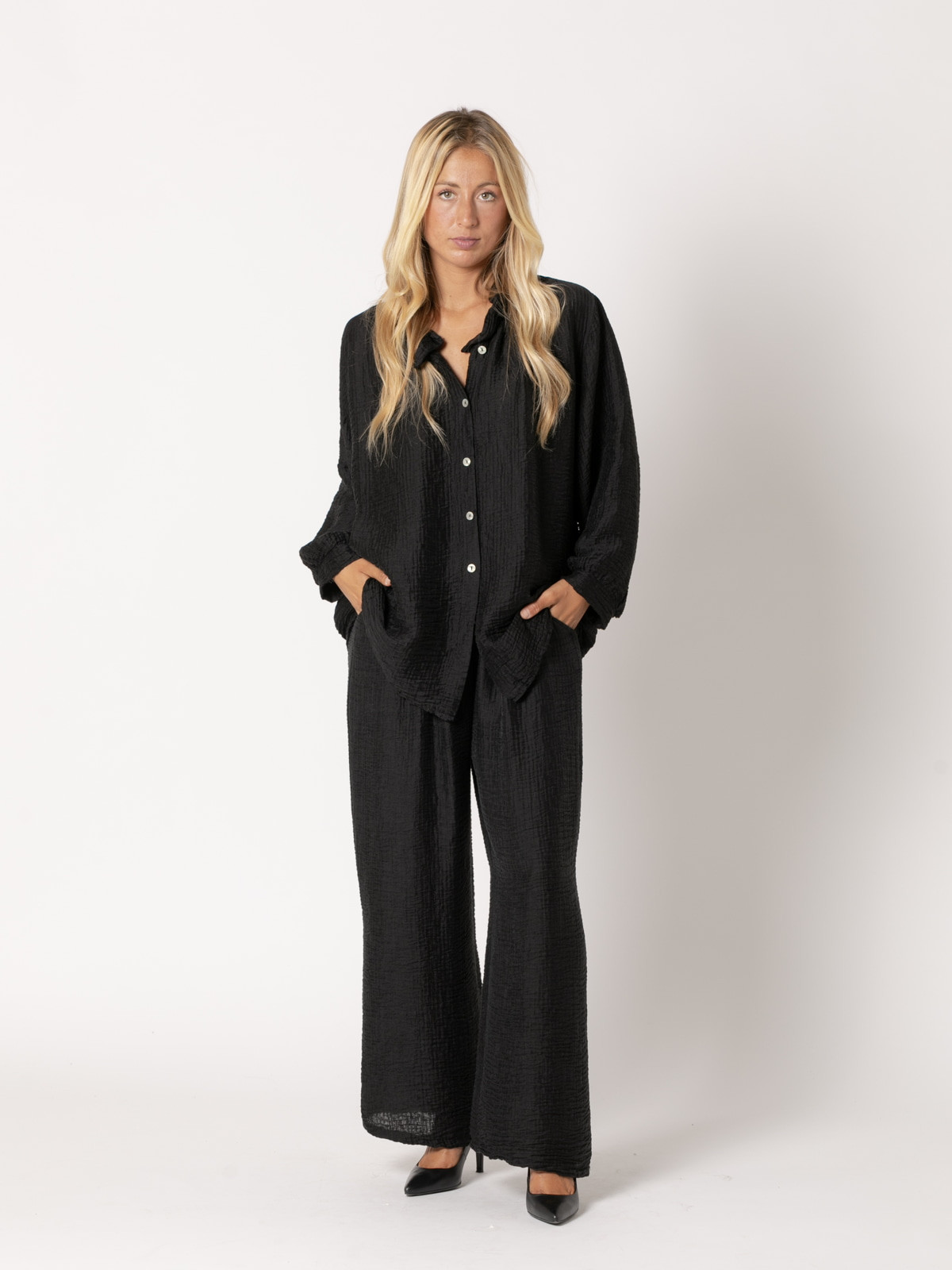 Camisa rizo volante brillo color Negro