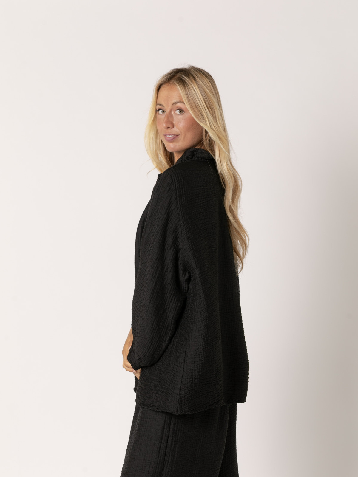Camisa rizo volante brillo color Negro
