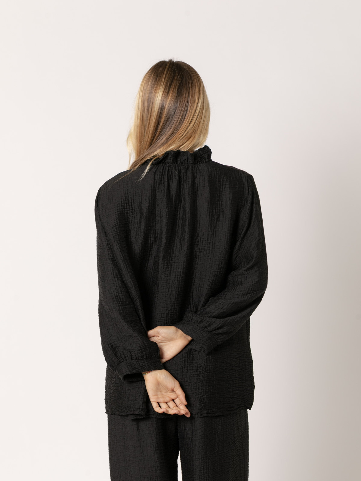 Camisa rizo volante brillo color Negro