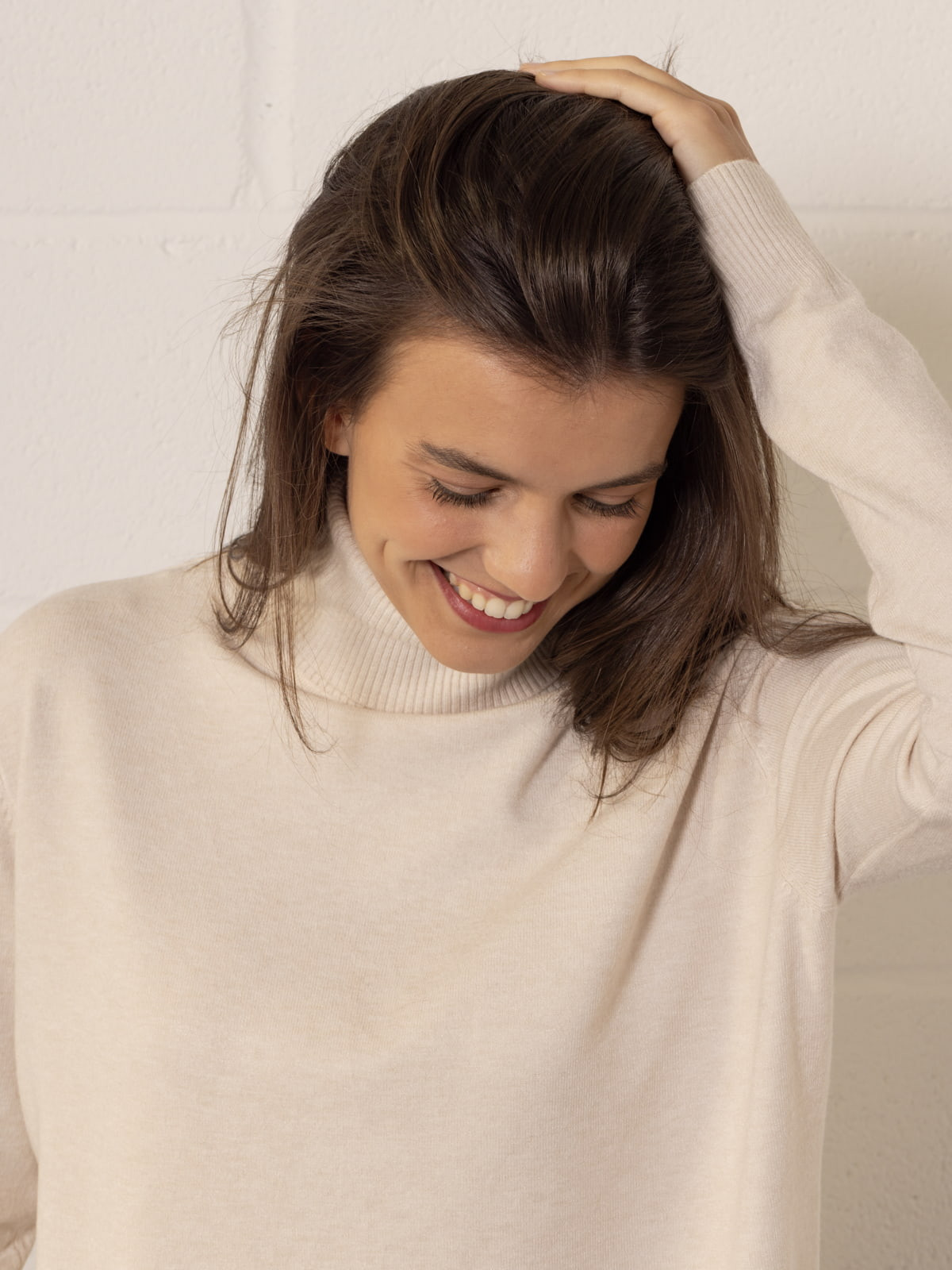 Soft jersey with a high neck  Beige colour