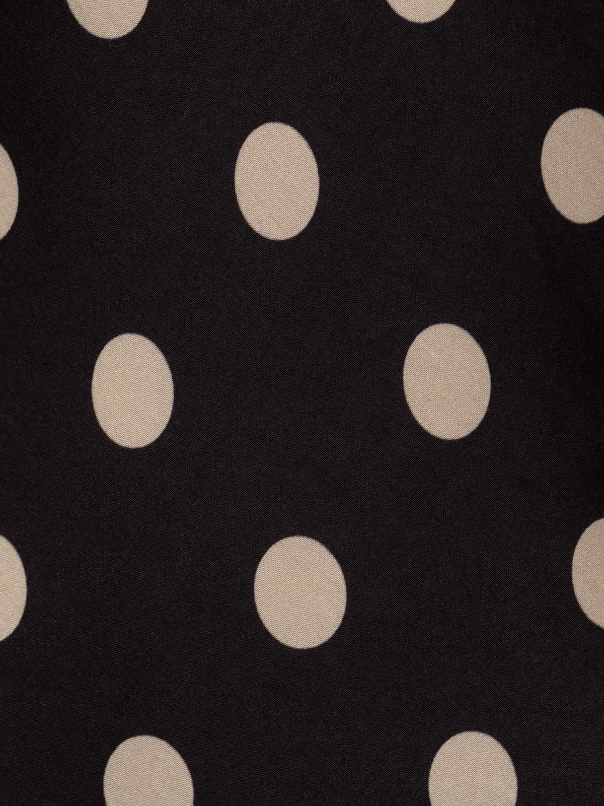 Top tirente motas color Negro