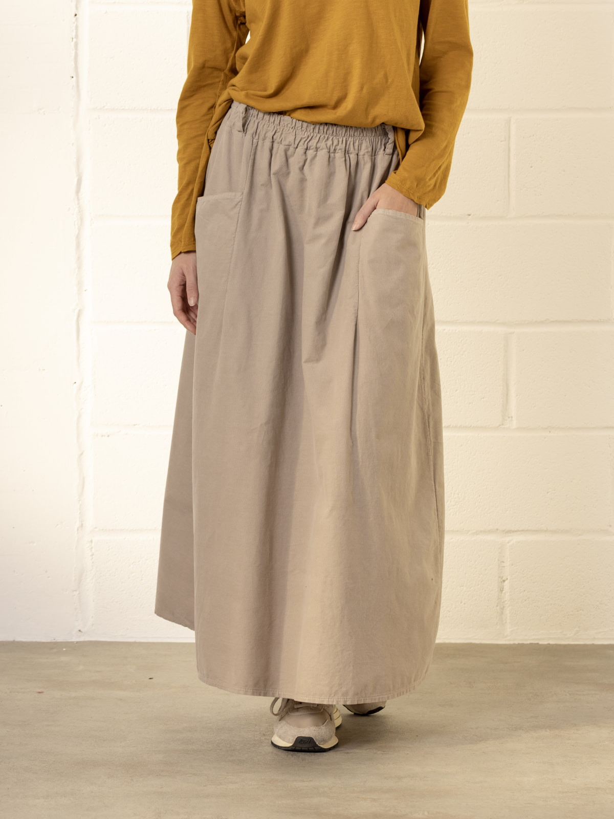 Corduroy skirt with pockets and belt loops  Beige colour