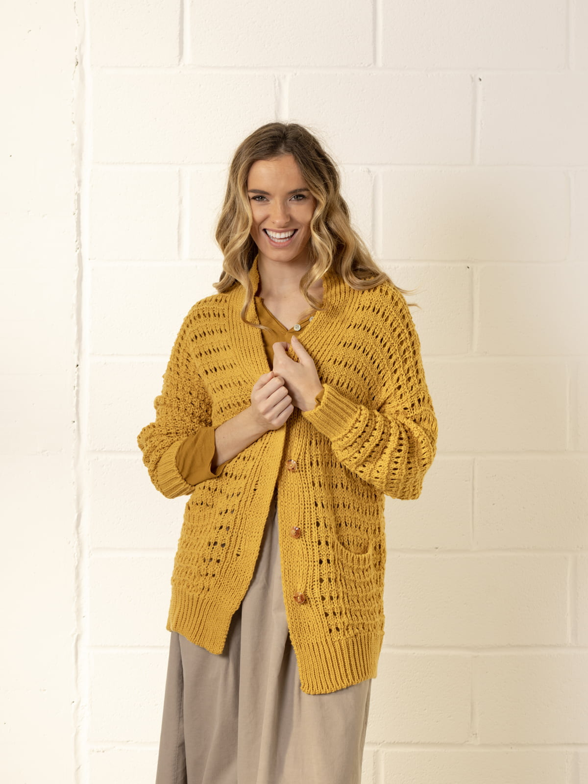 Oversized knitted jacket  Ocher colour